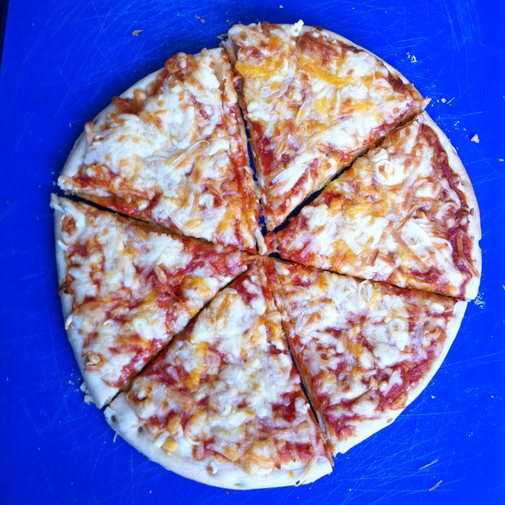 Photo of pizza cut into 6 pieces