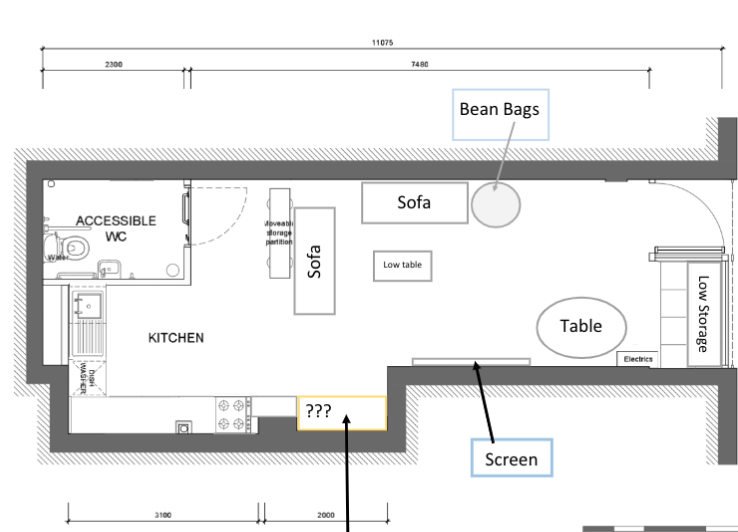 Plan of youth work space with accessible toilet, kitchen, sofas, table, screen, storage and bean bags. 